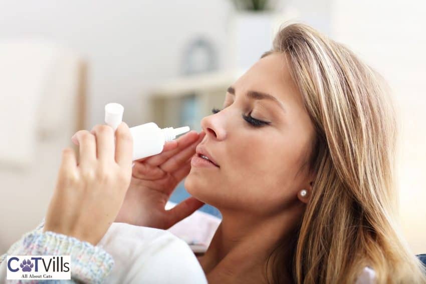 lady using nasal spray