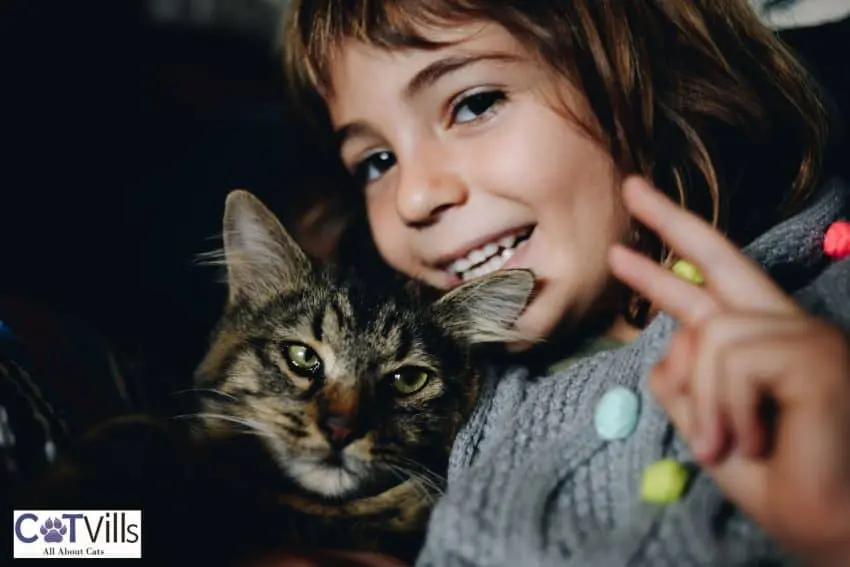 a girl with her pet kitten