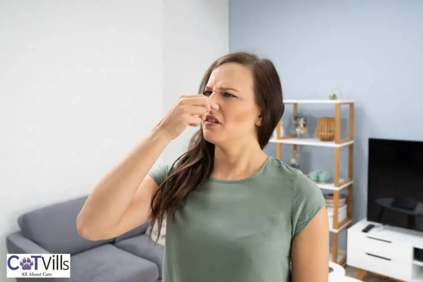 a woman covering her nose